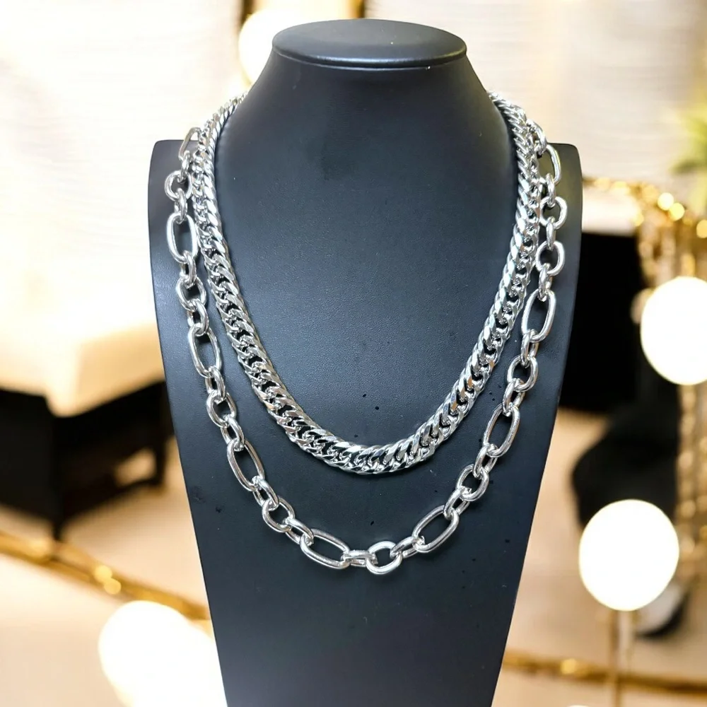 Stainless steel two piece Cuban chain-link necklace set.